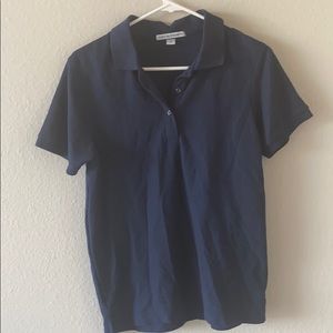 Small, blue collar polo